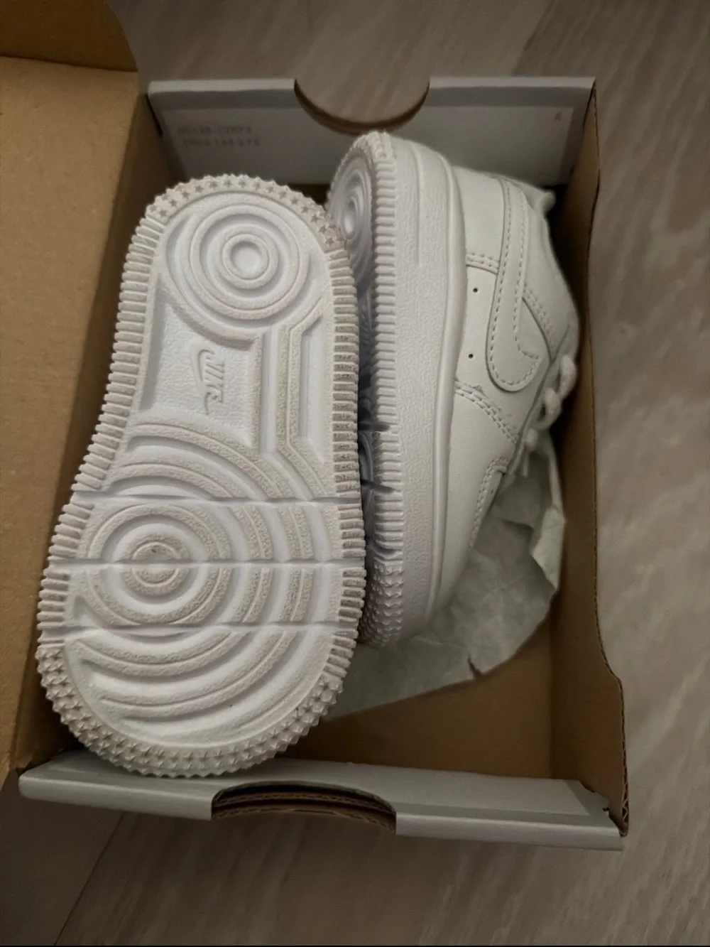 Nike Kids All-White Leather Sneakers